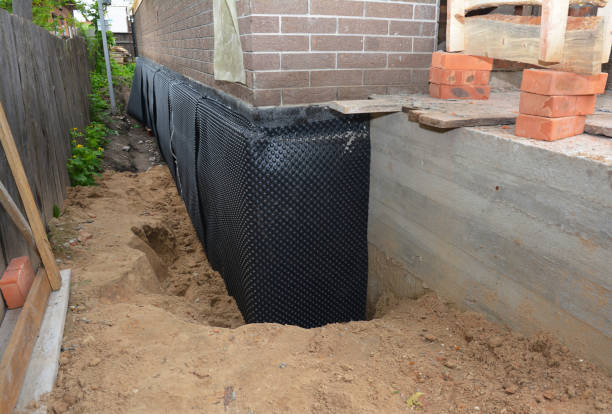 Happy homeowners after waterproofing job in Allenton